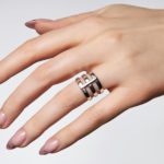 Beautiful white manicure with glitter. Nude manicure