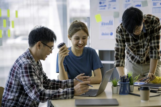 Group of Asian businessmen meeting team in modern office ​​Design planning structures and modern con