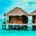 Maldives tropical Island, beautiful isolated luxury water bungalows Maldives in the blue green ocean