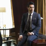 Portrait of successful businessman in study