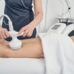Reducing fat in professional beauty clinic with modern technologies