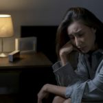 Woman suffering from depression and insomnia
